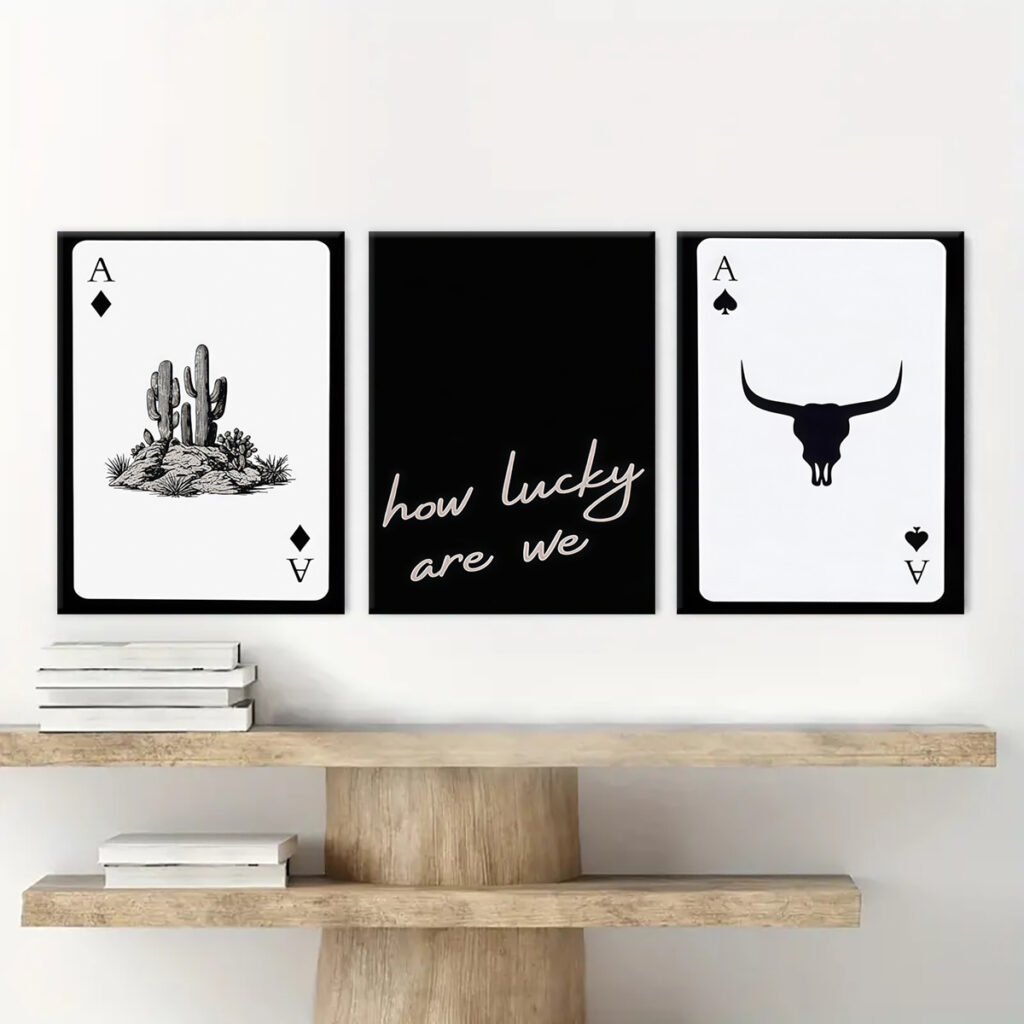 Black and white cactus and longhorn wall art in a modern living room