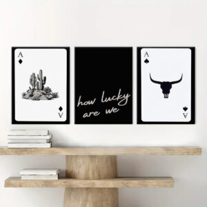 Black and white cactus and longhorn wall art in a modern living room