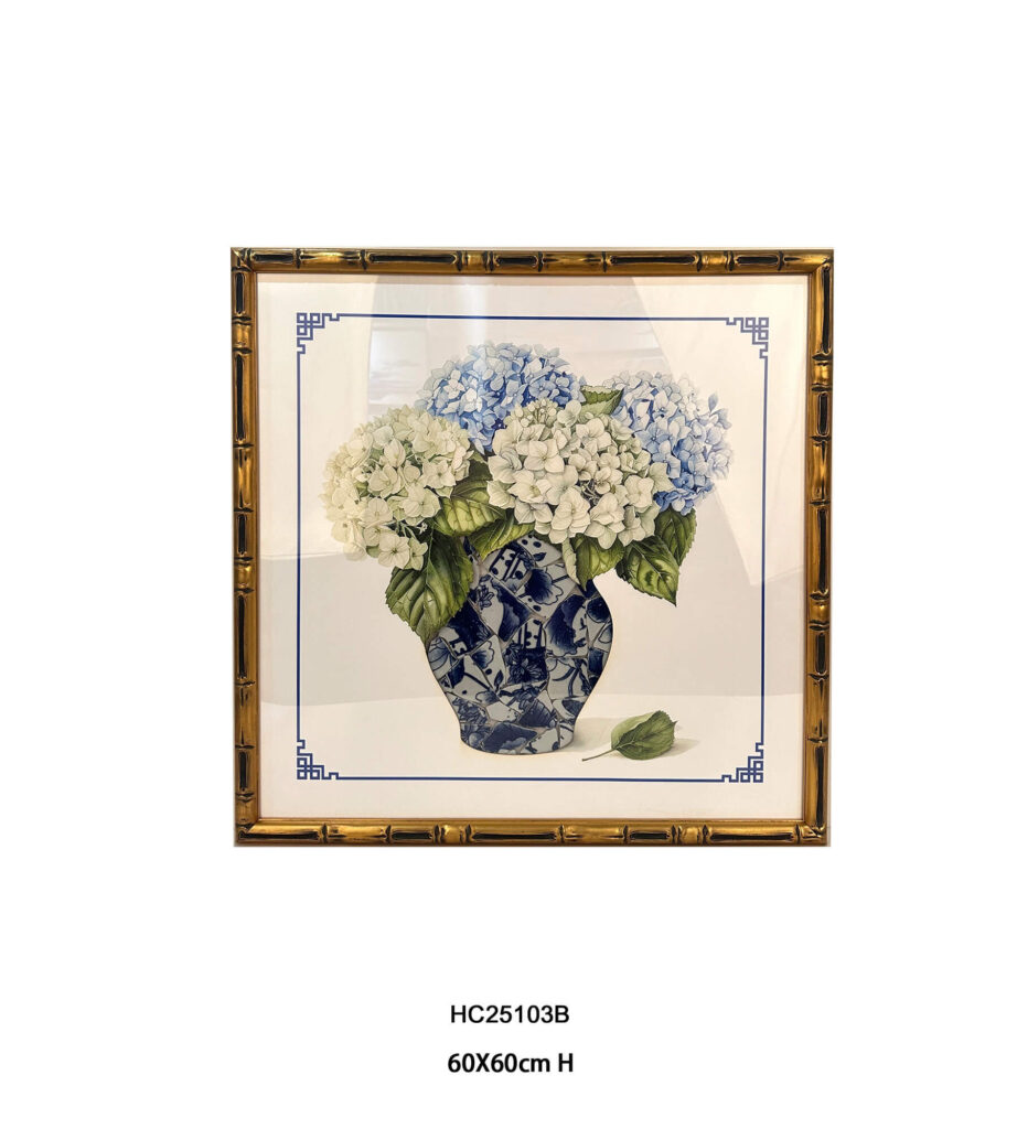 Blue and white hydrangeas in a porcelain shard vase