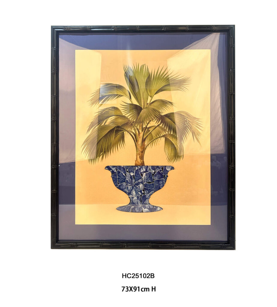 Framed porcelain palm tree art in a black bamboo-style frame