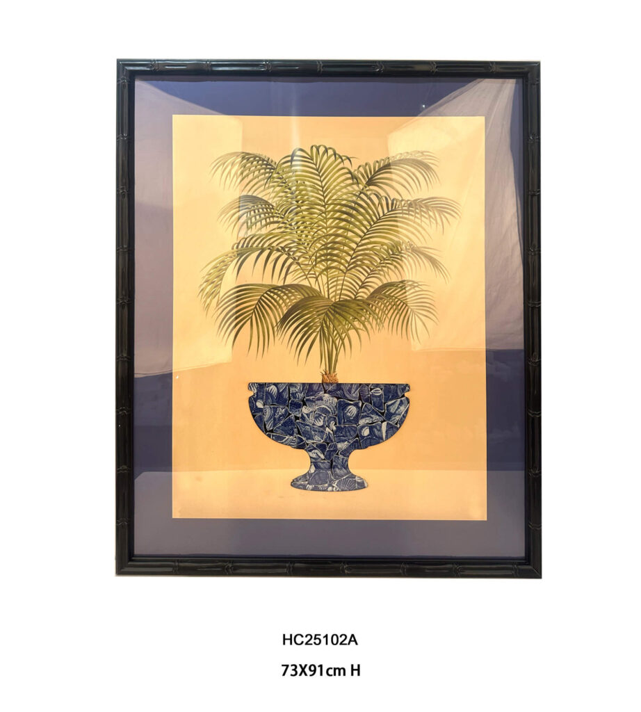 Framed fan palm art with a blue and white mosaic planter
