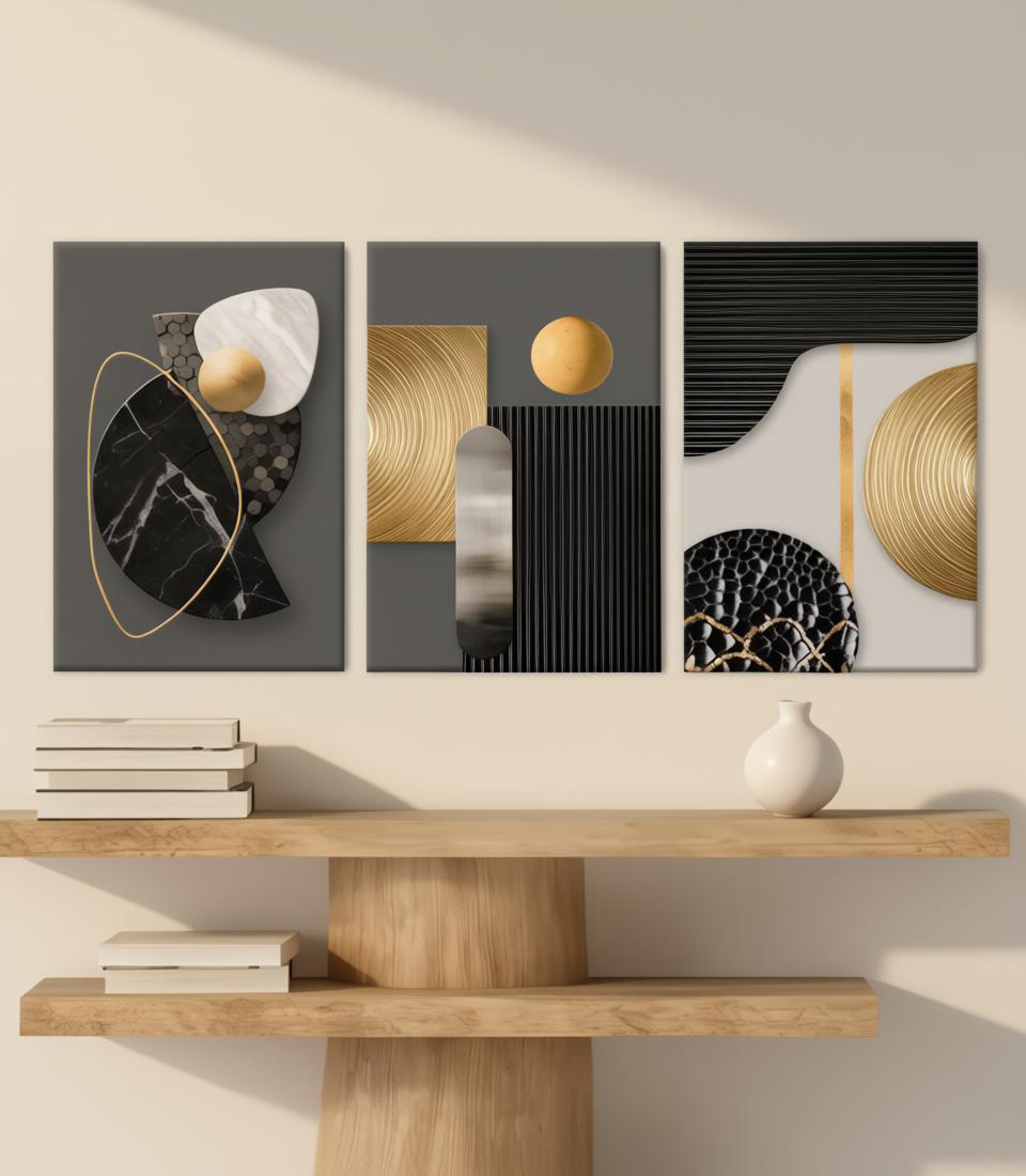Three piece geometric canvas wall art above a light wood console