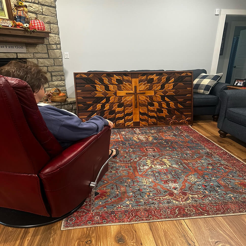 Large geometric wood wall art in a living room