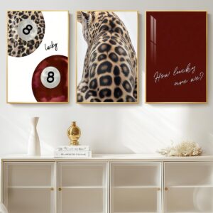 Leopard 8 ball canvas wall art set above a modern sideboard