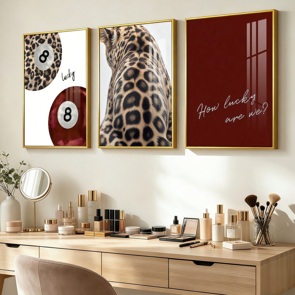Framed leopard and lucky 8 ball wall art above a vanity