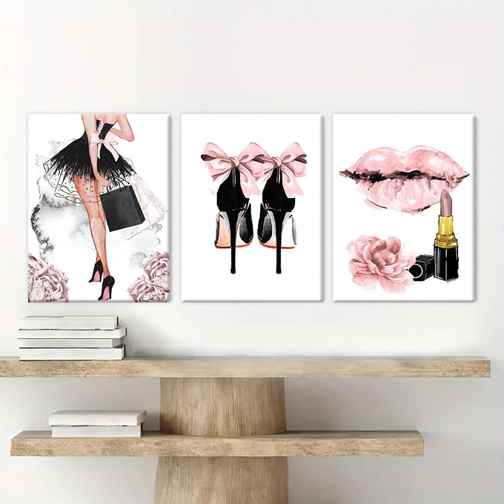 Pink fashion canvas wall art set displayed above wooden shelves