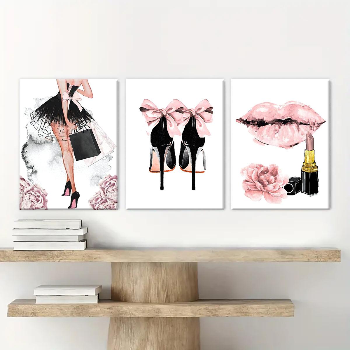 Pink fashion canvas wall art set displayed above wooden shelves