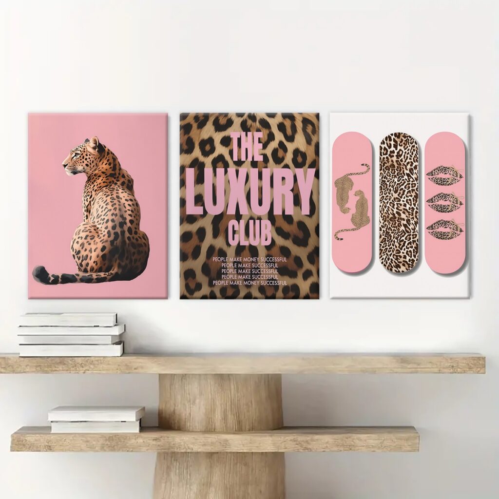 Pink leopard canvas wall art set above a modern wood shelf
