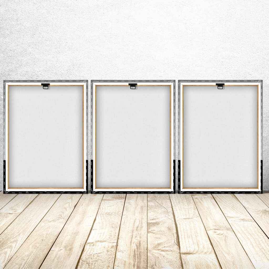 Back view of three stretched Porsche GT3 RS canvases with wooden frames