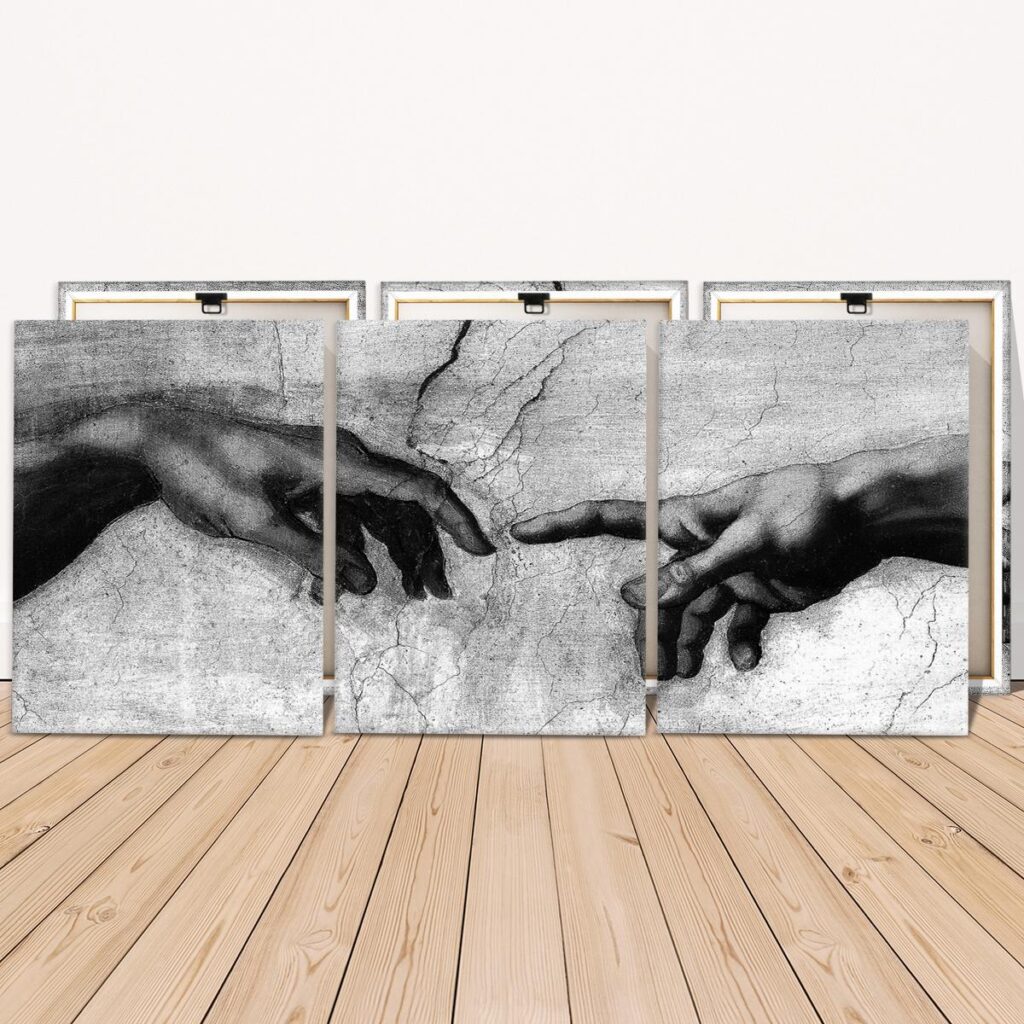 Rear view of three ready to hang canvases with wooden stretcher frames
