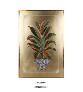 Red green cordyline porcelain wall art in a gold frame