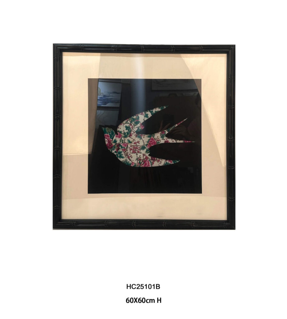 Single floral porcelain mosaic swallow on a black background