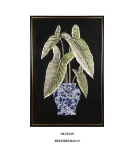 Framed tropical foliage porcelain wall art with elongated leaves