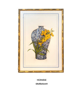 Floral porcelain wall art with yellow orchids and a blue and white mosaic vase