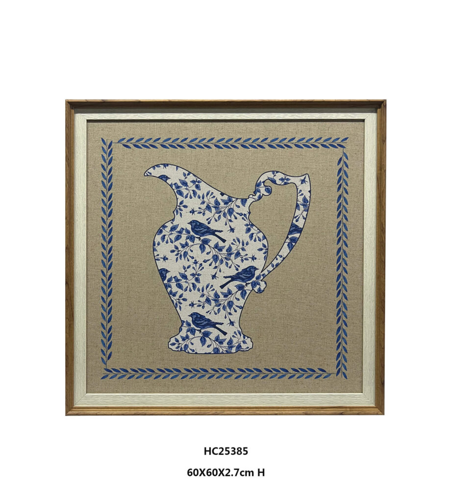 Framed blue and white pitcher wall art with floral bird motifs