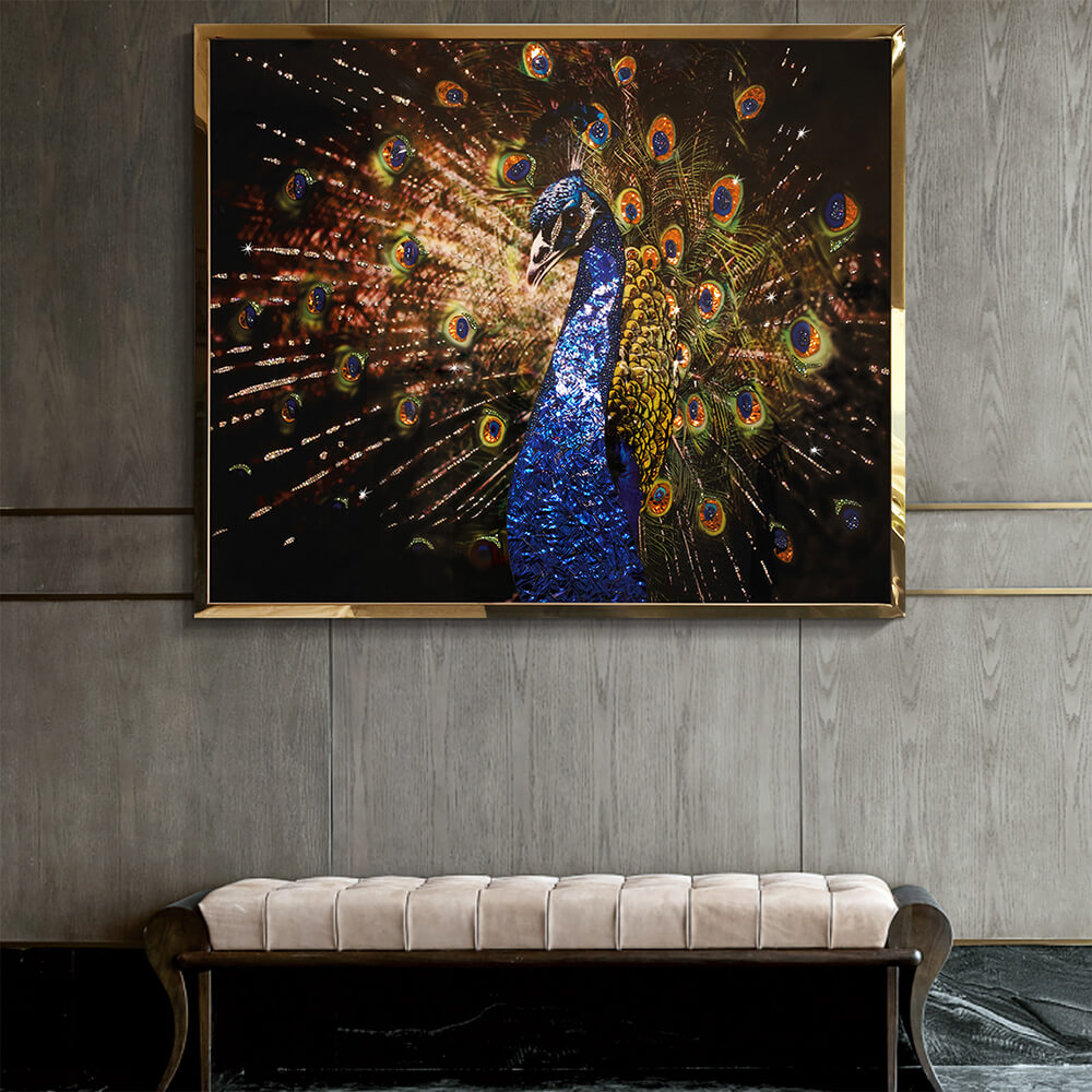 Blue and gold peacock wall art displayed above a beige bench
