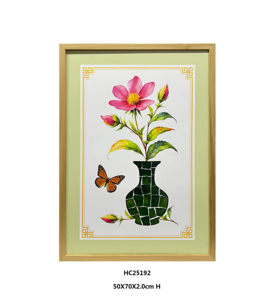 Framed botanical glass wall art with pink flowers a green vase and an orange butterfly