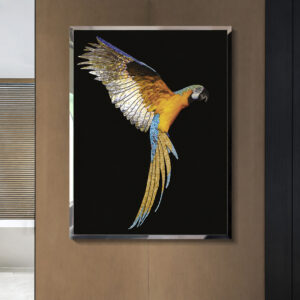 Blue gold crystal bird wall art in a bright living space