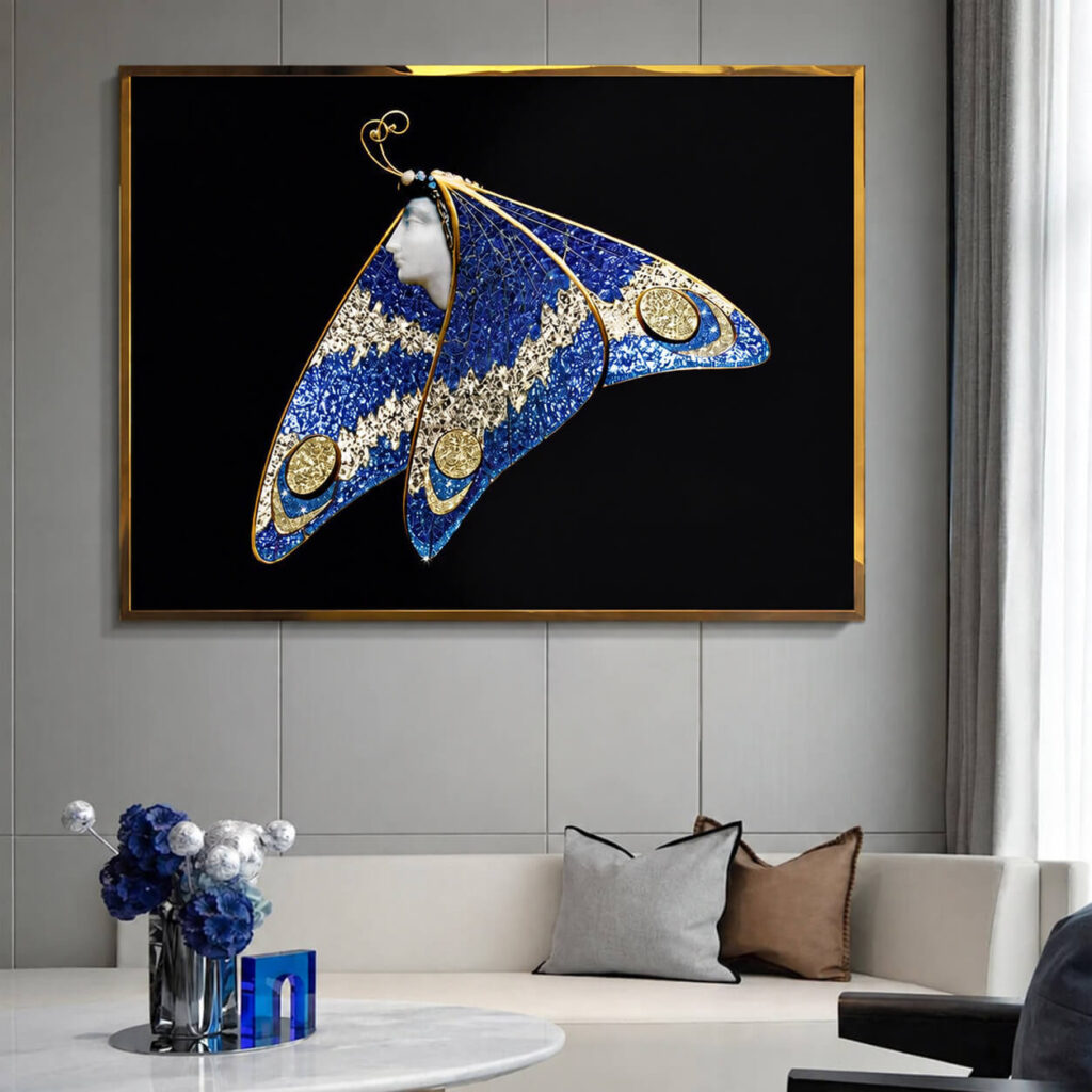 Crystal butterfly wall art in a gold frame above a modern sofa