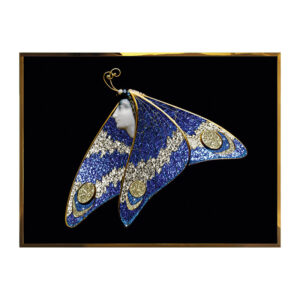 Framed blue and gold butterfly wall art on a white background