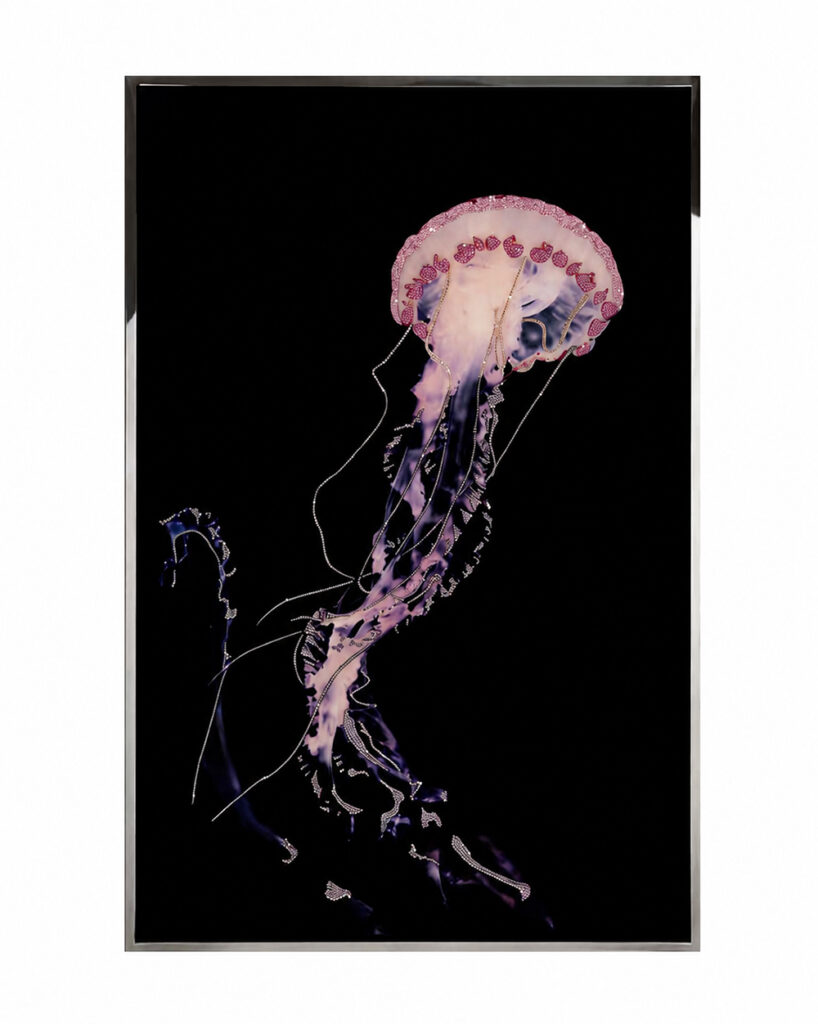 Pink crystal jellyfish wall art in a black metal frame
