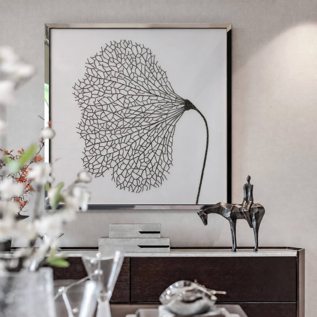 Black botanical leaf wall art with Swarovski crystals in a silver metal frame