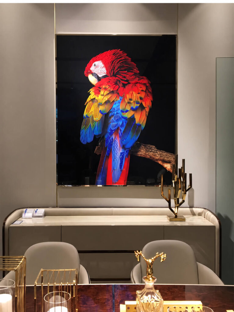 Colorful parrot wall art above a console