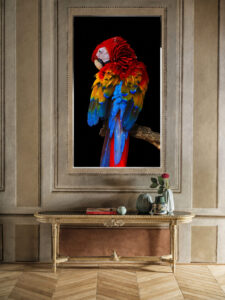 Crystal parrot wall art above a fireplace mantel
