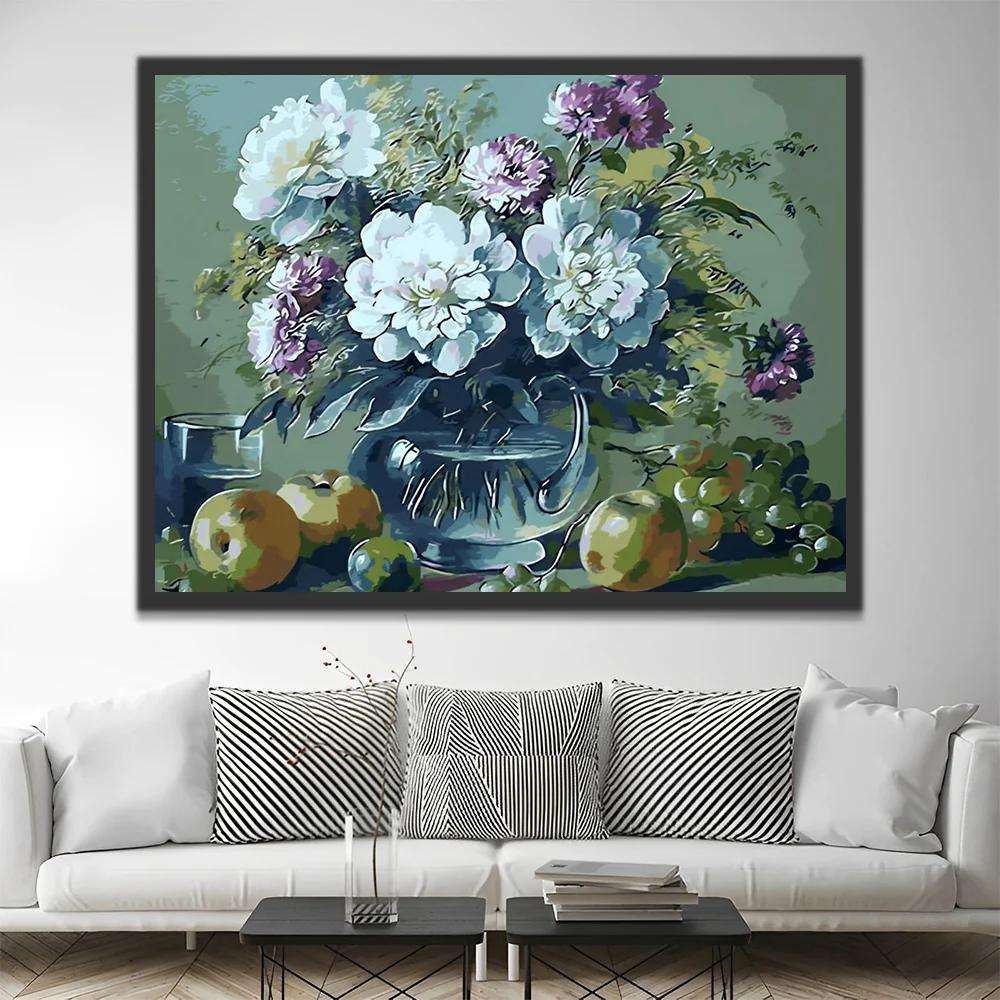 Framed floral wall art above a white sofa in a modern living room