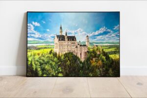 Framed Neuschwanstein Castle canvas with a bright Bavarian landscape