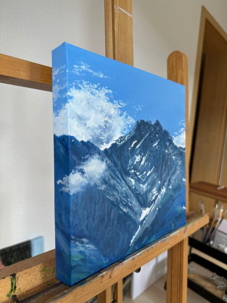 Side view of hand painted mountain oil painting on canvas