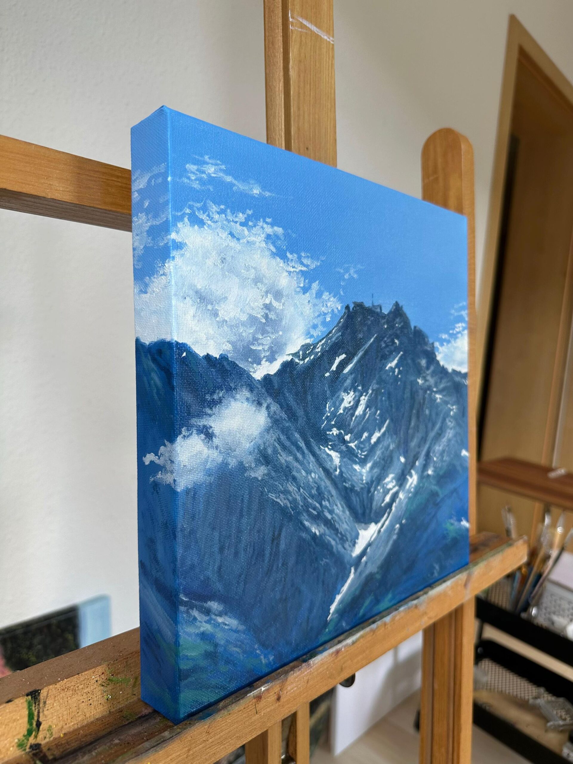 Side view of hand painted mountain oil painting on canvas
