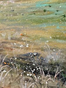 Close view of hand-painted oil texture and splattered details on canvas
