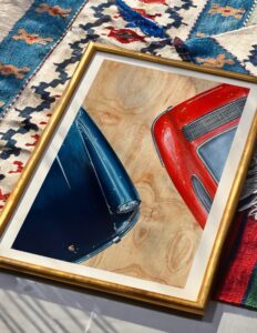 Sports car canvas wall art with a wood grain background and gold frame
