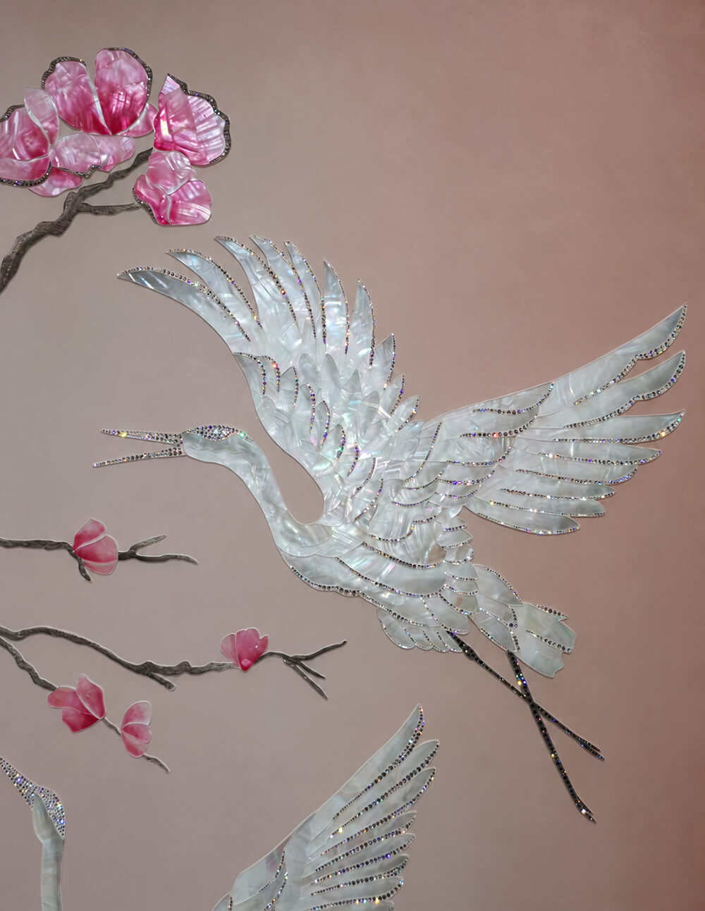 Close up of crystal accents on a mother of pearl crane