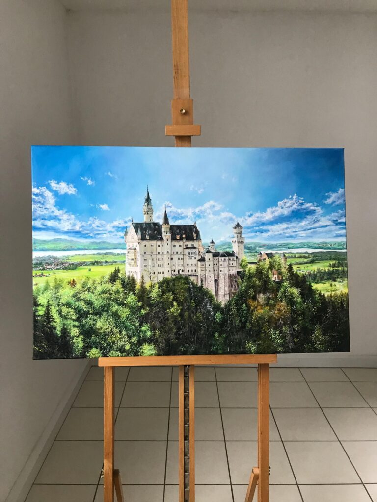 Neuschwanstein Castle canvas wall art displayed on a wooden easel
