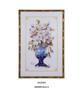 Framed glass floral wall art with pink blossoms and a blue mosaic vase