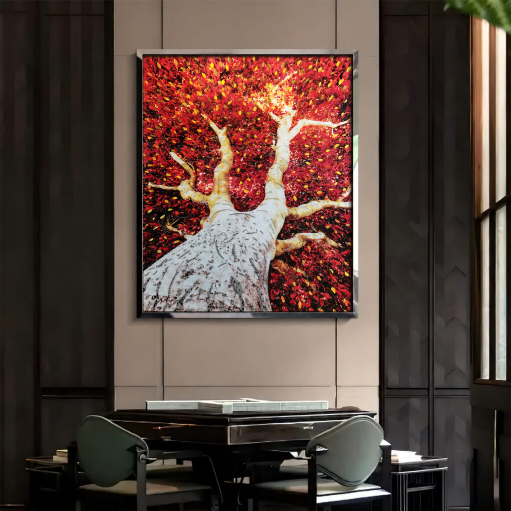 Red tree wall art displayed above a dining table