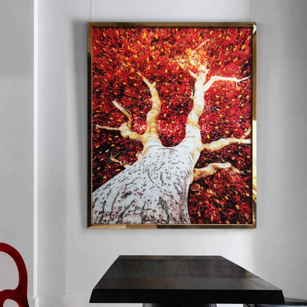 Red tree wall art in a gold aluminum frame