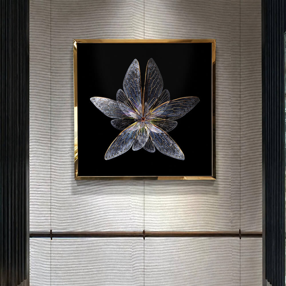 Framed silver wing crystal wall art against light blinds and dark curtains