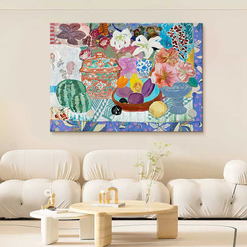 Colorful still life oil painting displayed above a white sectional sofa