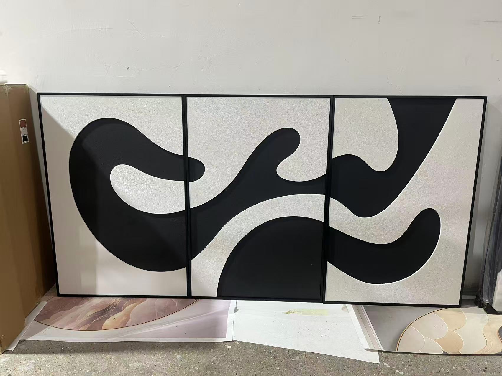 Black and White Abstract Wall Art in a Flowing Triptych Design