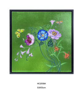 floral and butterfly wall art with a green background