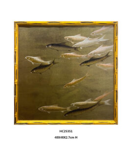 gold school of fish wall art with black and pale fish