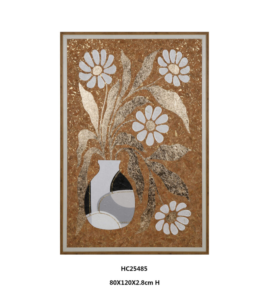 Framed white flowers and gold leaves in a black and white vase on cork