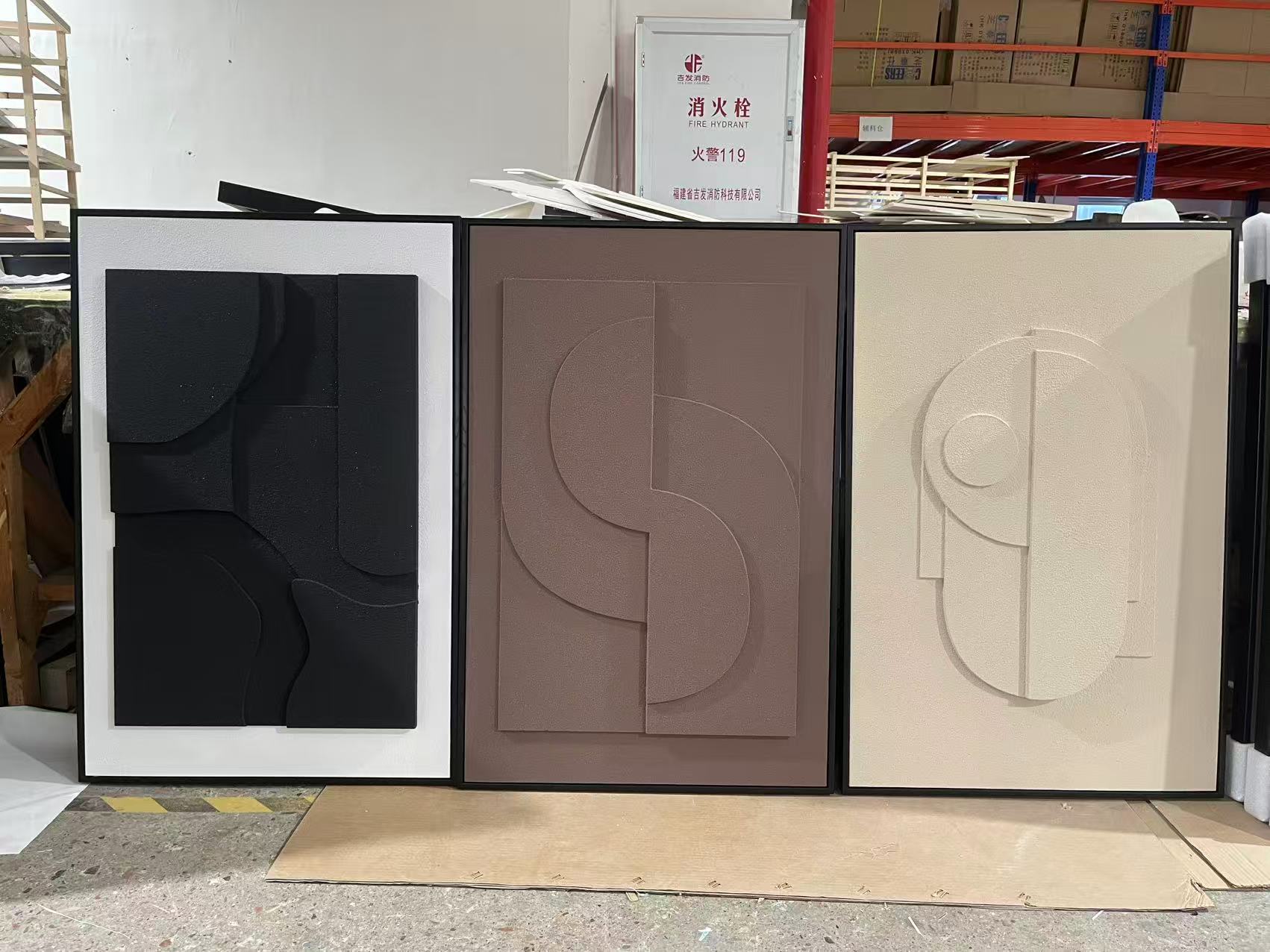 Minimalist Geometric Relief Wall Art with circles in black, taupe and ivory