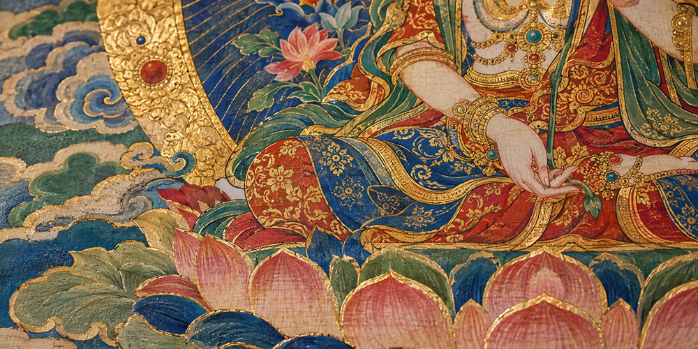 Layered red, blue, and green pigments meet intricate gold Thangka outlines.