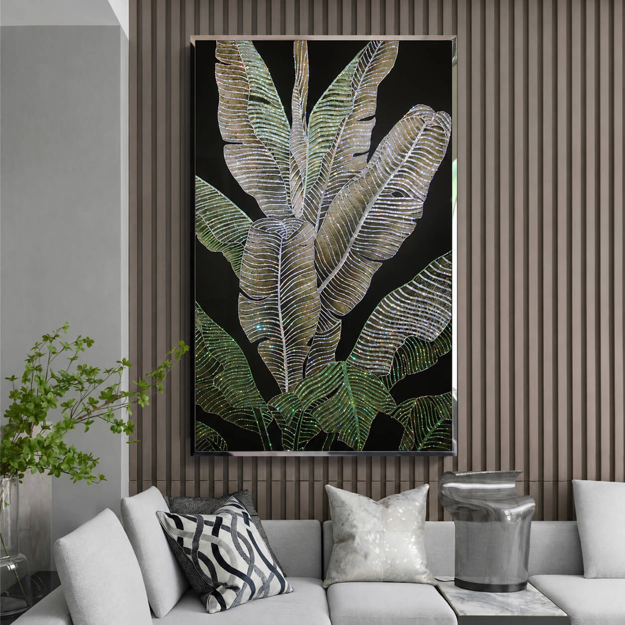 Crystal tropical leaf artwork on a vertical wood slat wall