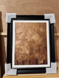 Framed vintage brown abstract wall art with white bevel mat